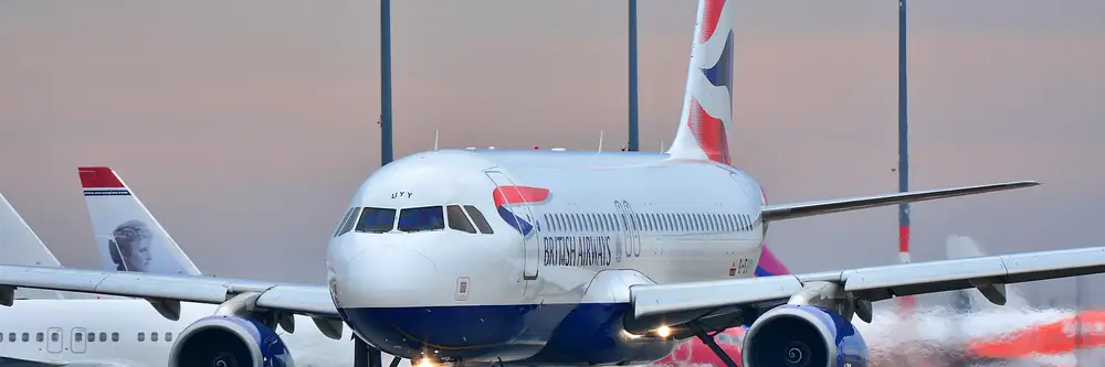 British Airways jet taxiing at an airport